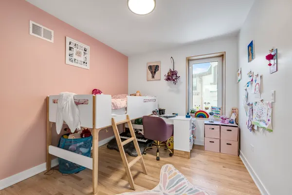 a view of a workspace with furniture and toys