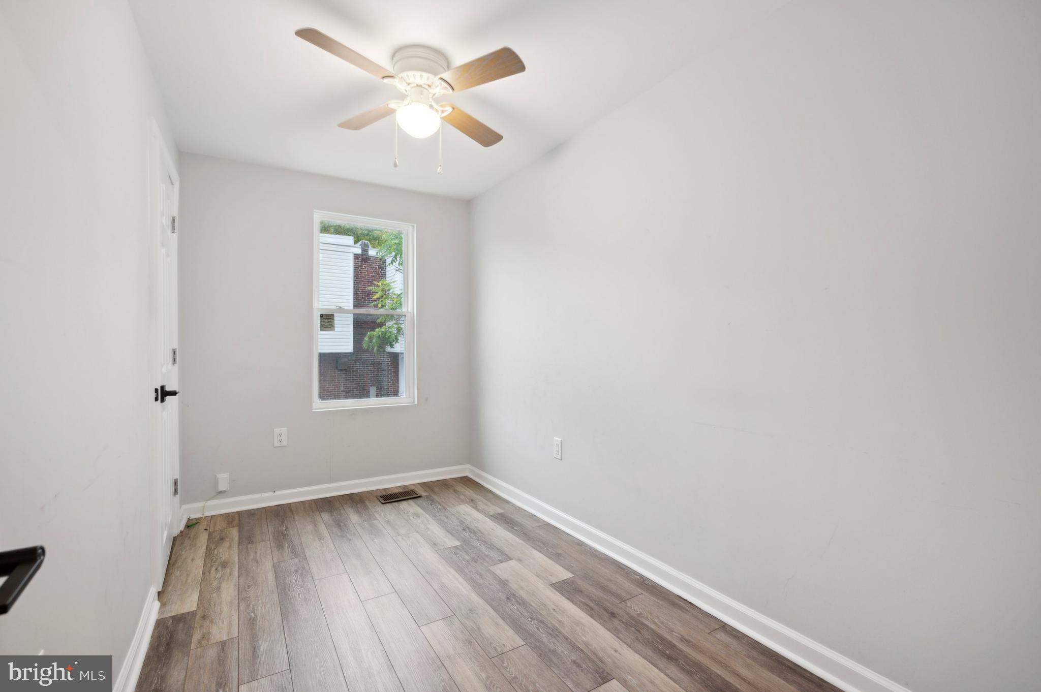 4520 Fernhill Road Philadelphia, PA 19144 - Photo 11 of 30 an empty room with a window and a fan