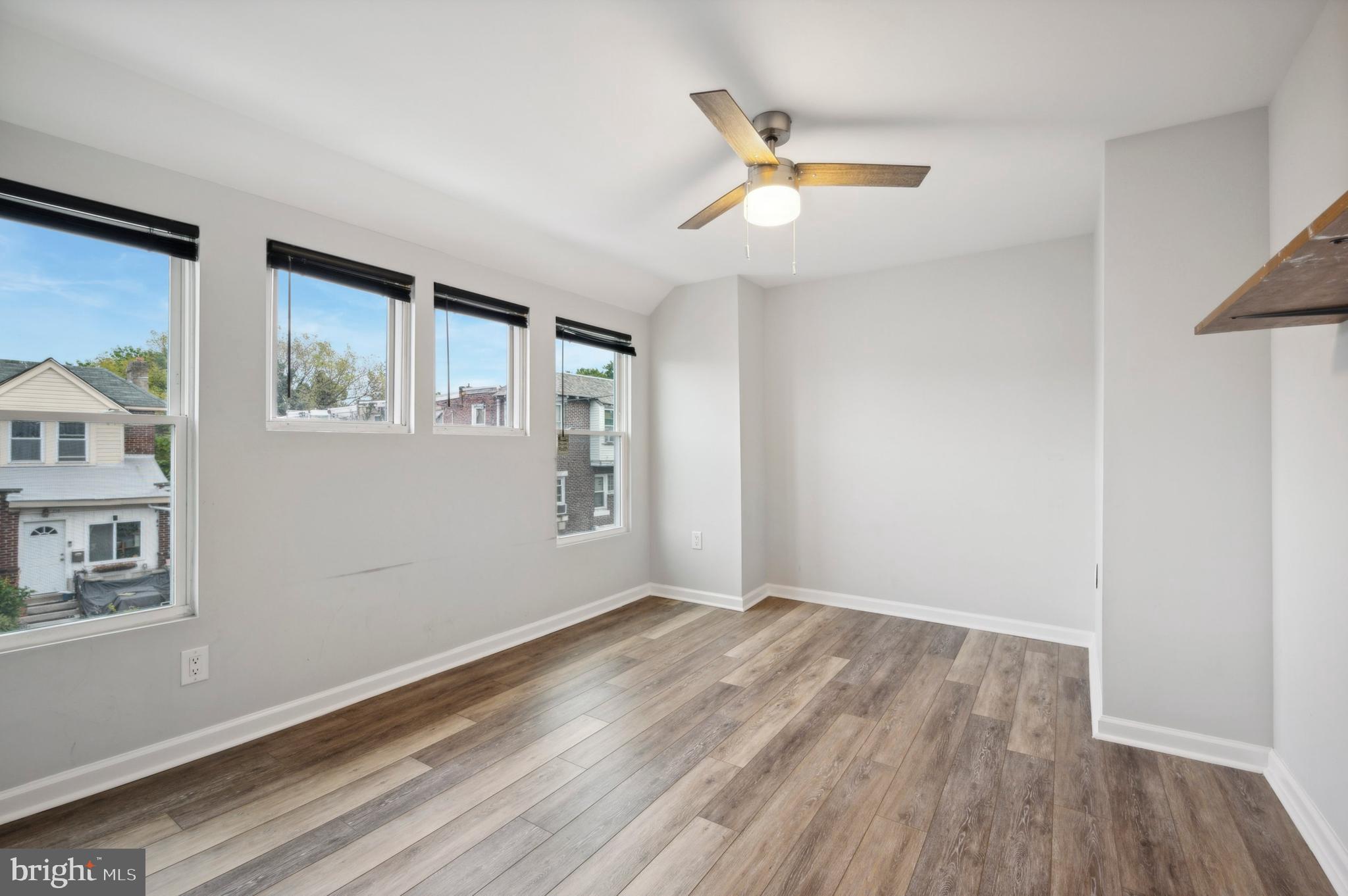 4520 Fernhill Road Philadelphia, PA 19144 - Photo 13 of 30 a view of empty room with wooden floor and fan