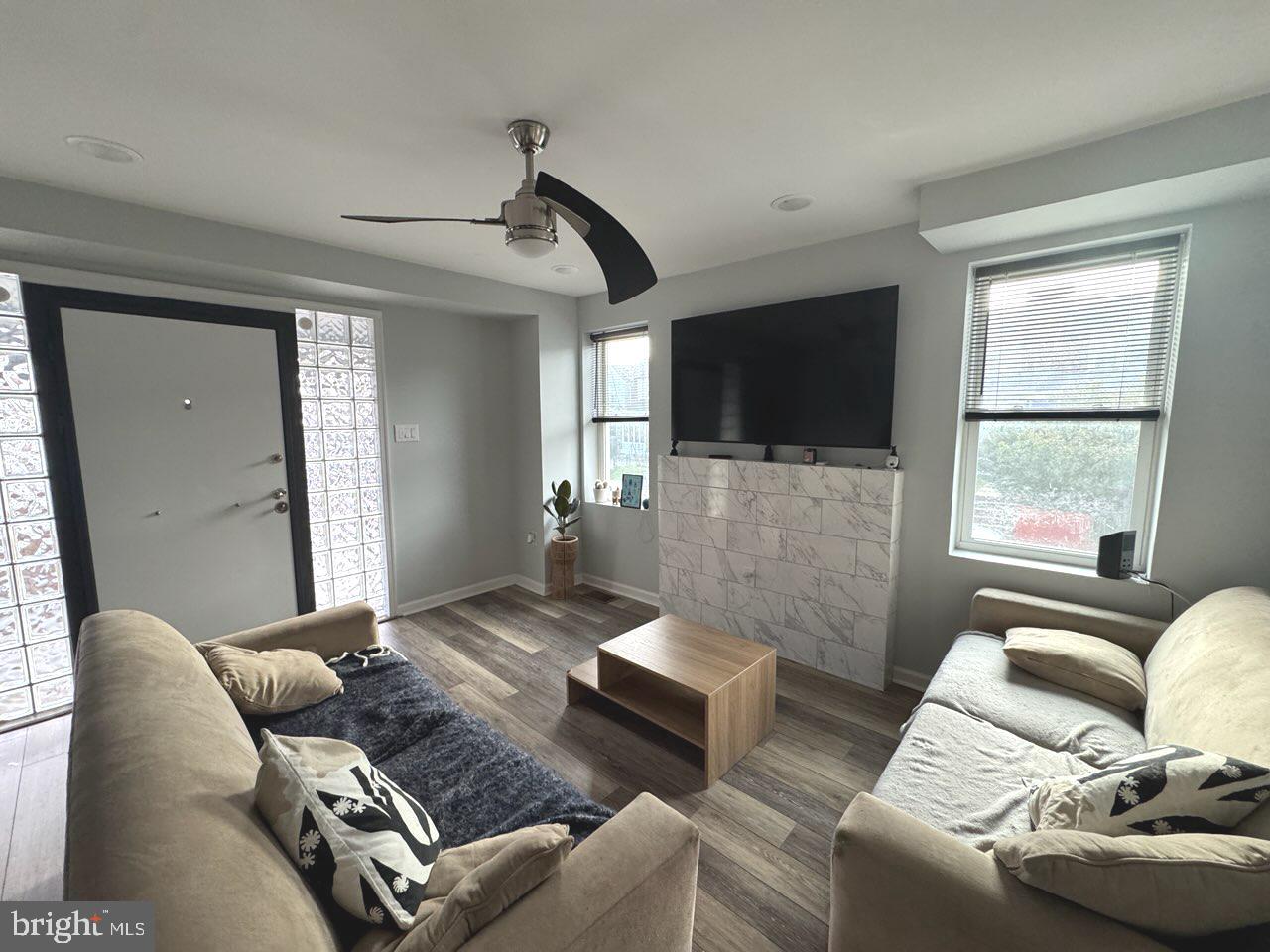 4520 Fernhill Road Philadelphia, PA 19144 - Photo 18 of 30 a living room with furniture and a flat screen tv