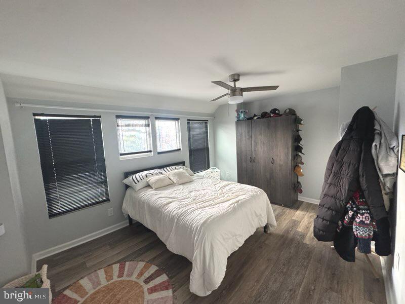 4520 Fernhill Road Philadelphia, PA 19144 - Photo 20 of 30 a bed sitting in a bedroom next to a window and a chandelier