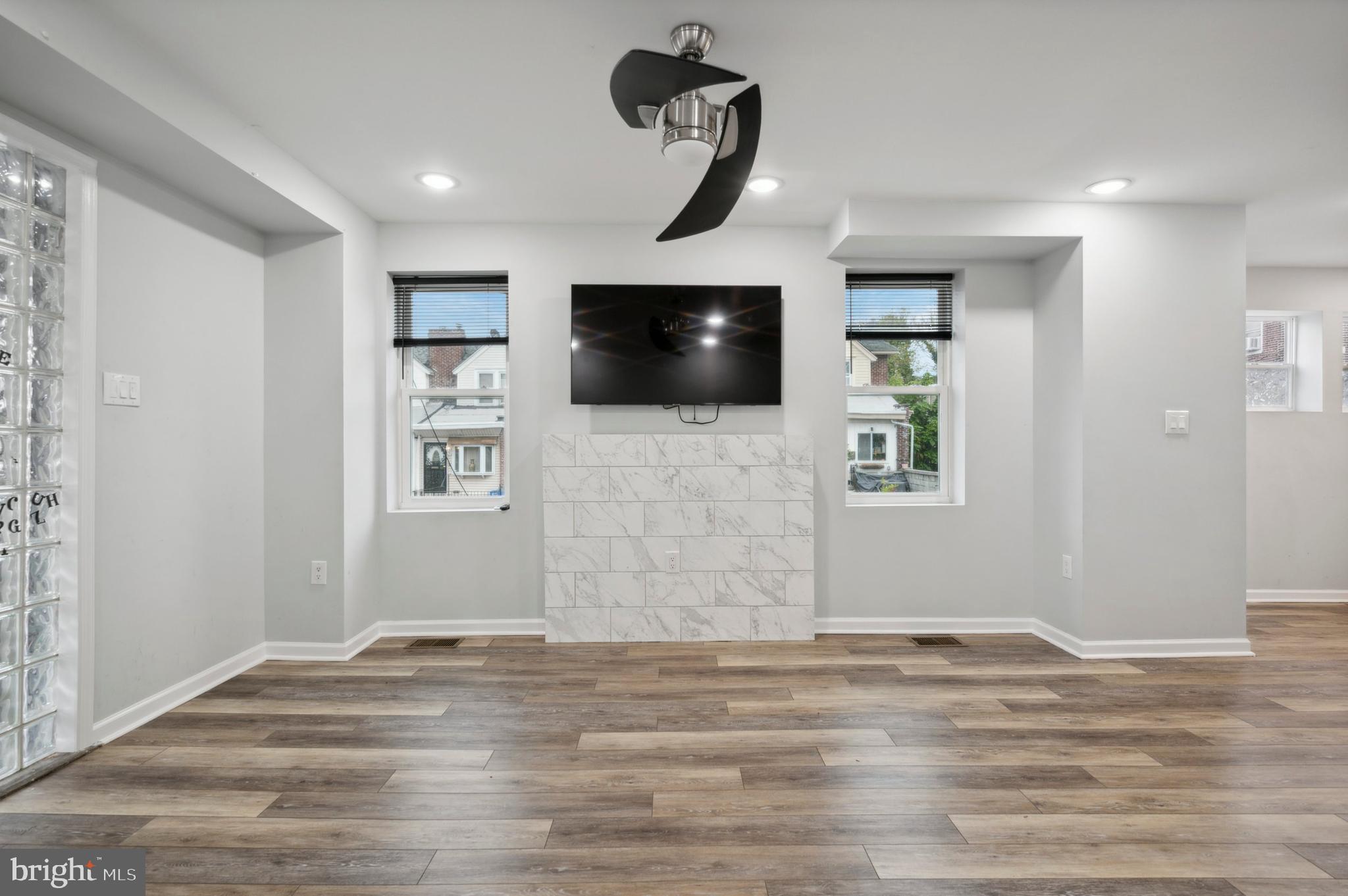 4520 Fernhill Road Philadelphia, PA 19144 - Photo 2 of 30 a view of a livingroom and a flat screen tv