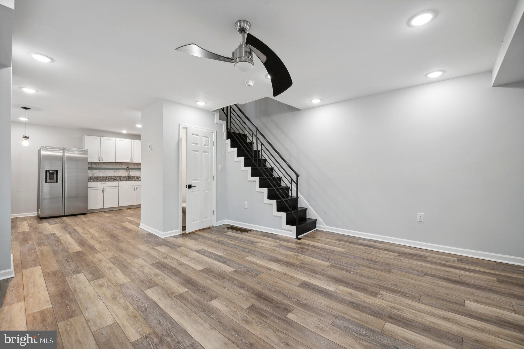 4520 Fernhill Road Philadelphia, PA 19144 - Photo 3 of 30 a view of an empty room with wooden floor entryway and kitchen view