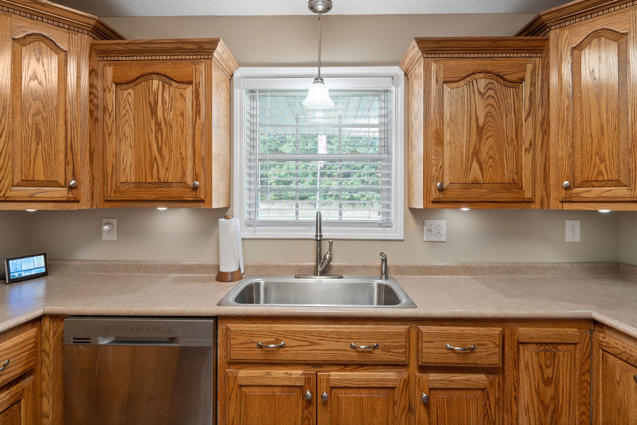 1216 Green Shanty Road Tennessee Ridge, TN 37178 - Photo 11 of 20 a kitchen with stainless steel appliances granite countertop a sink a refrigerator and cabinets