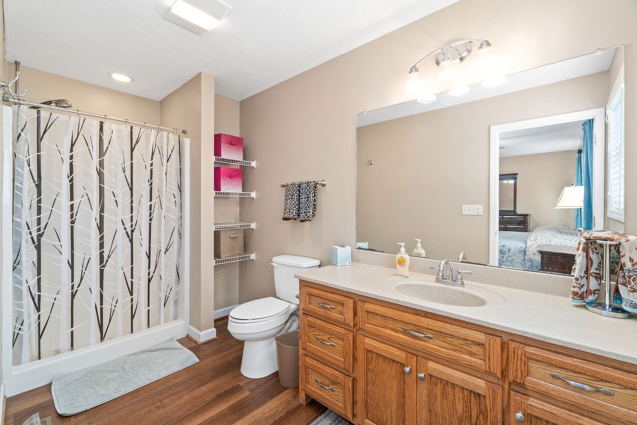 1216 Green Shanty Road Tennessee Ridge, TN 37178 - Photo 15 of 20 a bathroom with a sink toilet and shower