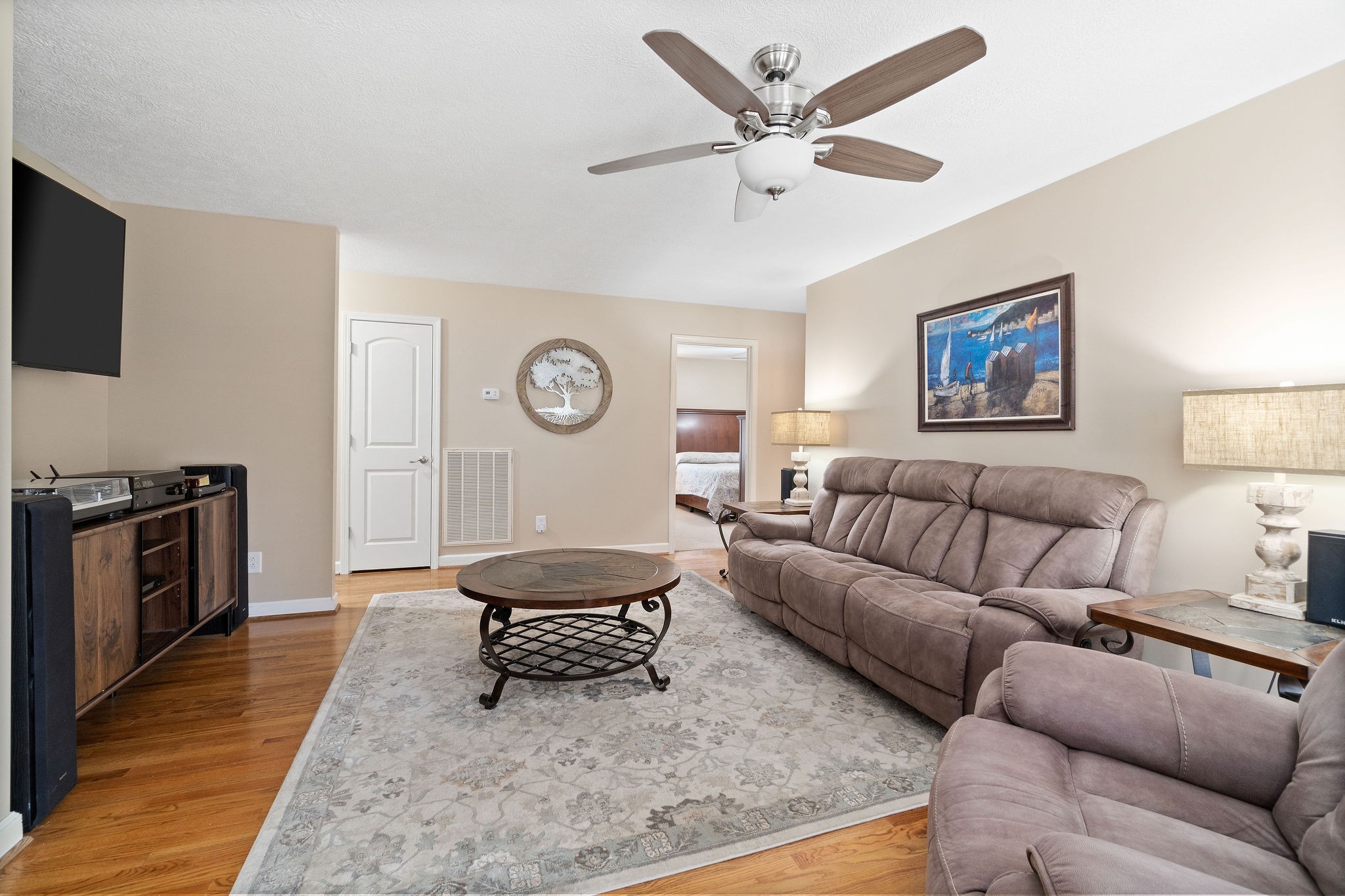 1216 Green Shanty Road Tennessee Ridge, TN 37178 - Photo 5 of 20 a living room with furniture and a wooden floor
