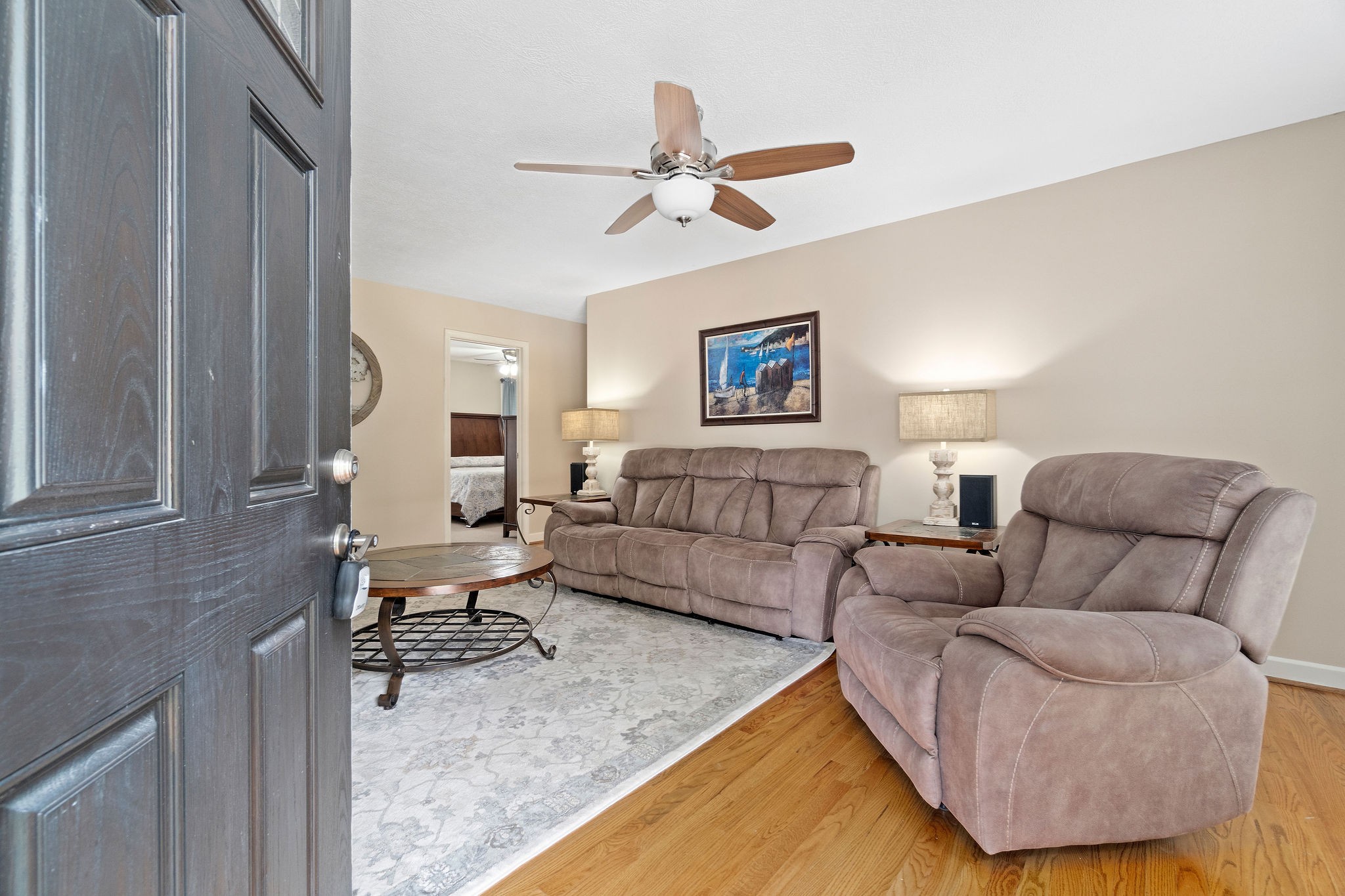 1216 Green Shanty Road Tennessee Ridge, TN 37178 - Photo 6 of 20 a living room with furniture and a chandelier