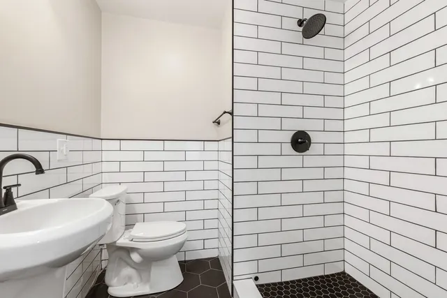 a bathroom with a sink and a toilet