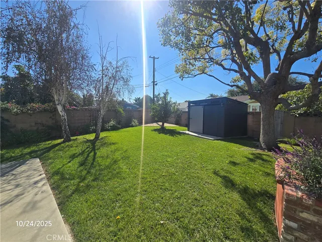 a view of a backyard with a garden