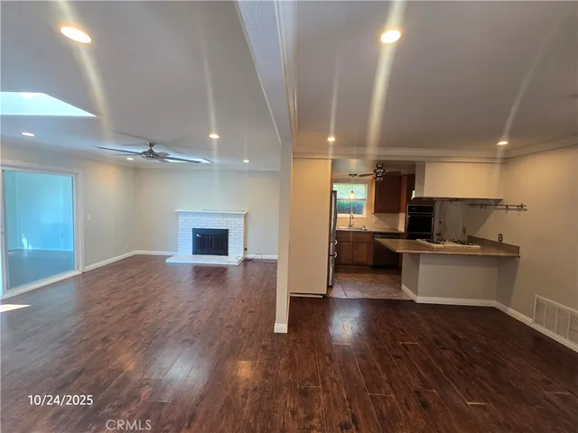 a view of kitchen with microwave and stove