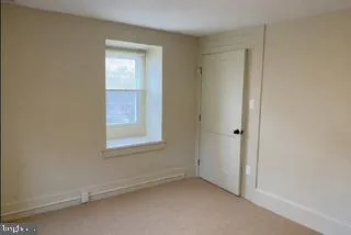 a view of a small space with window