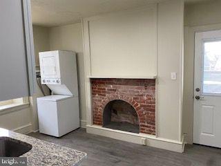 278 A Newtown Road Warminster, PA 18974 - Photo 4 of 21 a living room with furniture and a fireplace