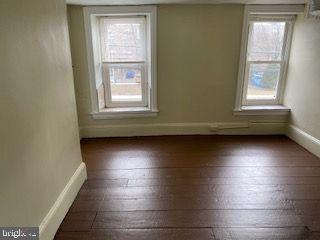 278 A Newtown Road Warminster, PA 18974 - Photo 8 of 21 a view of wooden floor and windows in a room