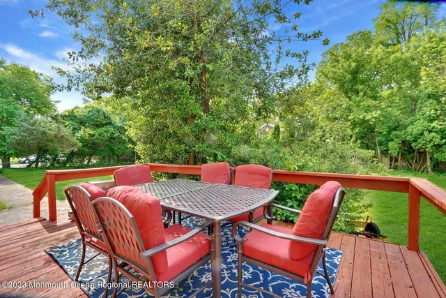 a outdoor view with sitting space and trees