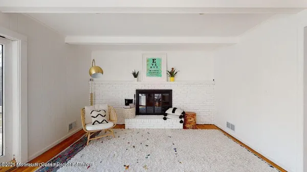 a bed room with furniture and a fireplace