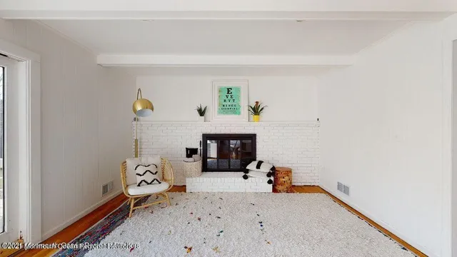 a bed room with furniture and a fireplace