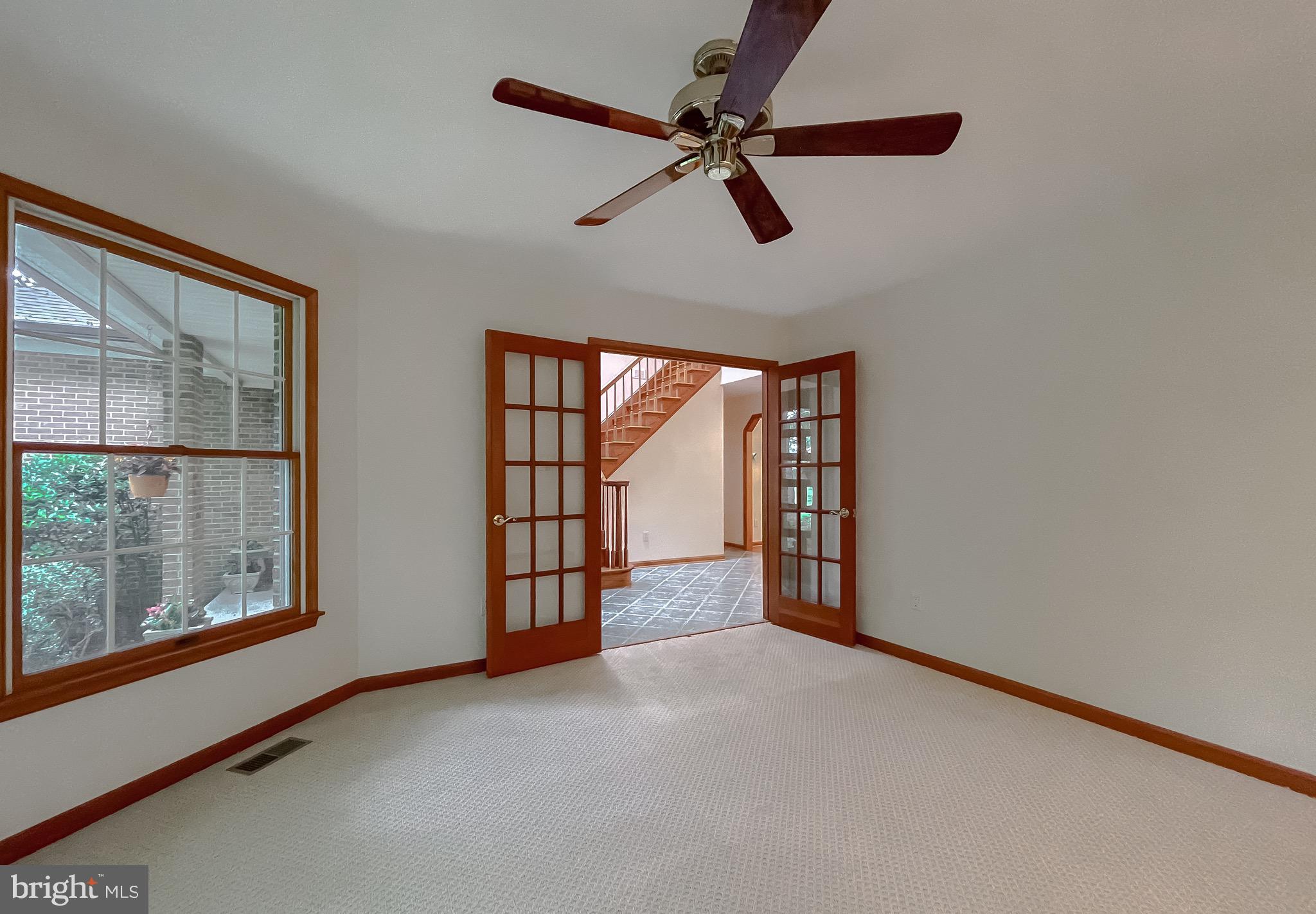 3050 Ross Road St. Leonard, MD 20685 - Photo 19 of 87 wooden floor in an empty room with a window