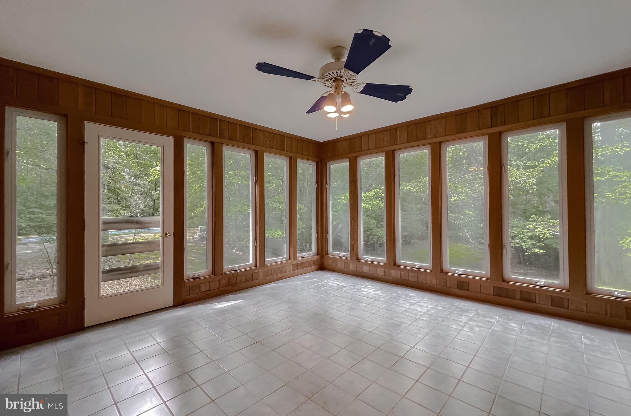3050 Ross Road St. Leonard, MD 20685 - Photo 32 of 87 Sun Room with cedar walls and lots of windows