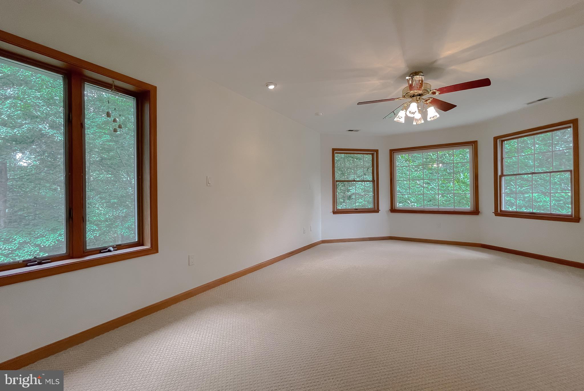 3050 Ross Road St. Leonard, MD 20685 - Photo 40 of 87 a view of an empty room with a window