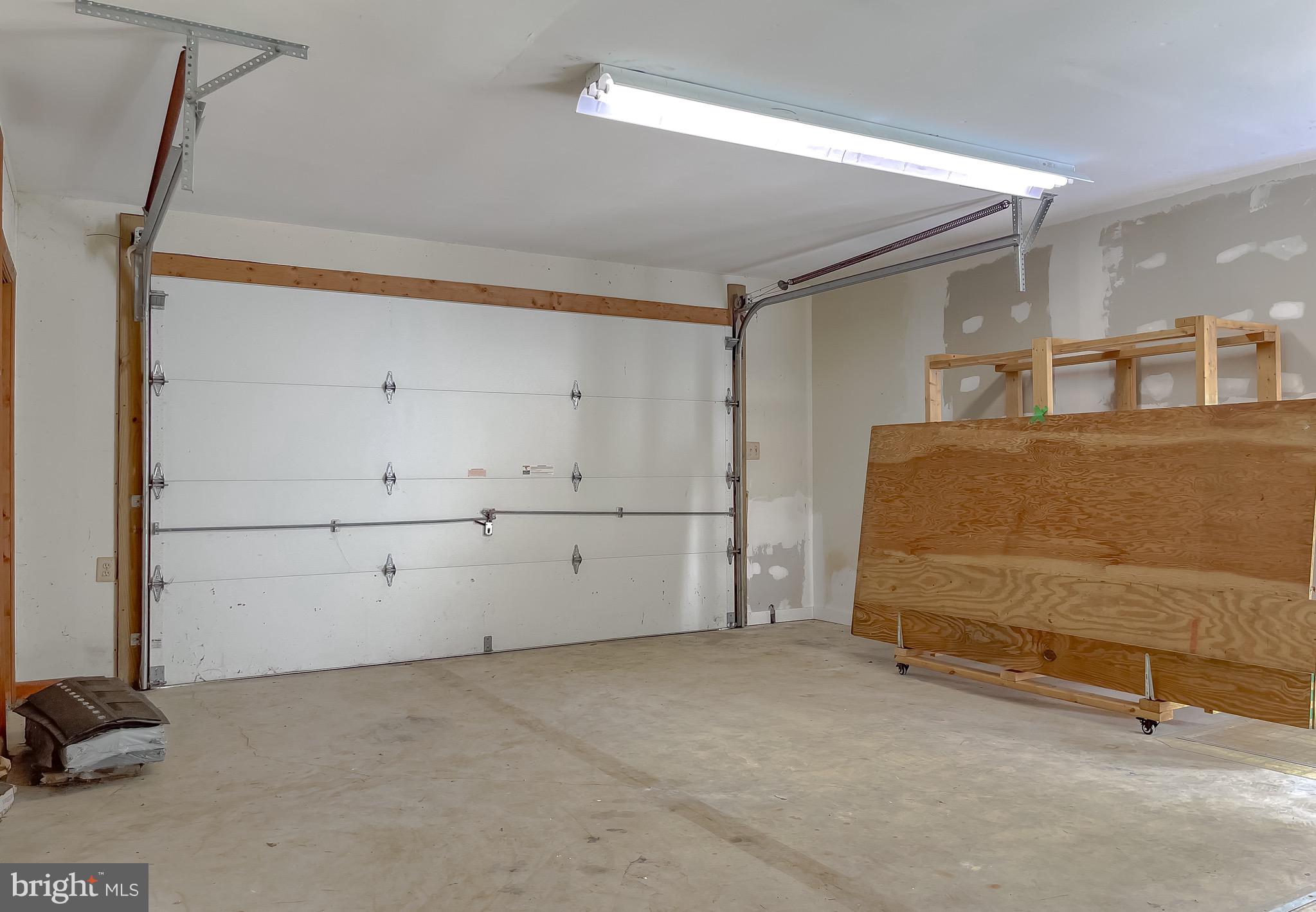 3050 Ross Road St. Leonard, MD 20685 - Photo 78 of 87 a room with a dresser and gym equipment