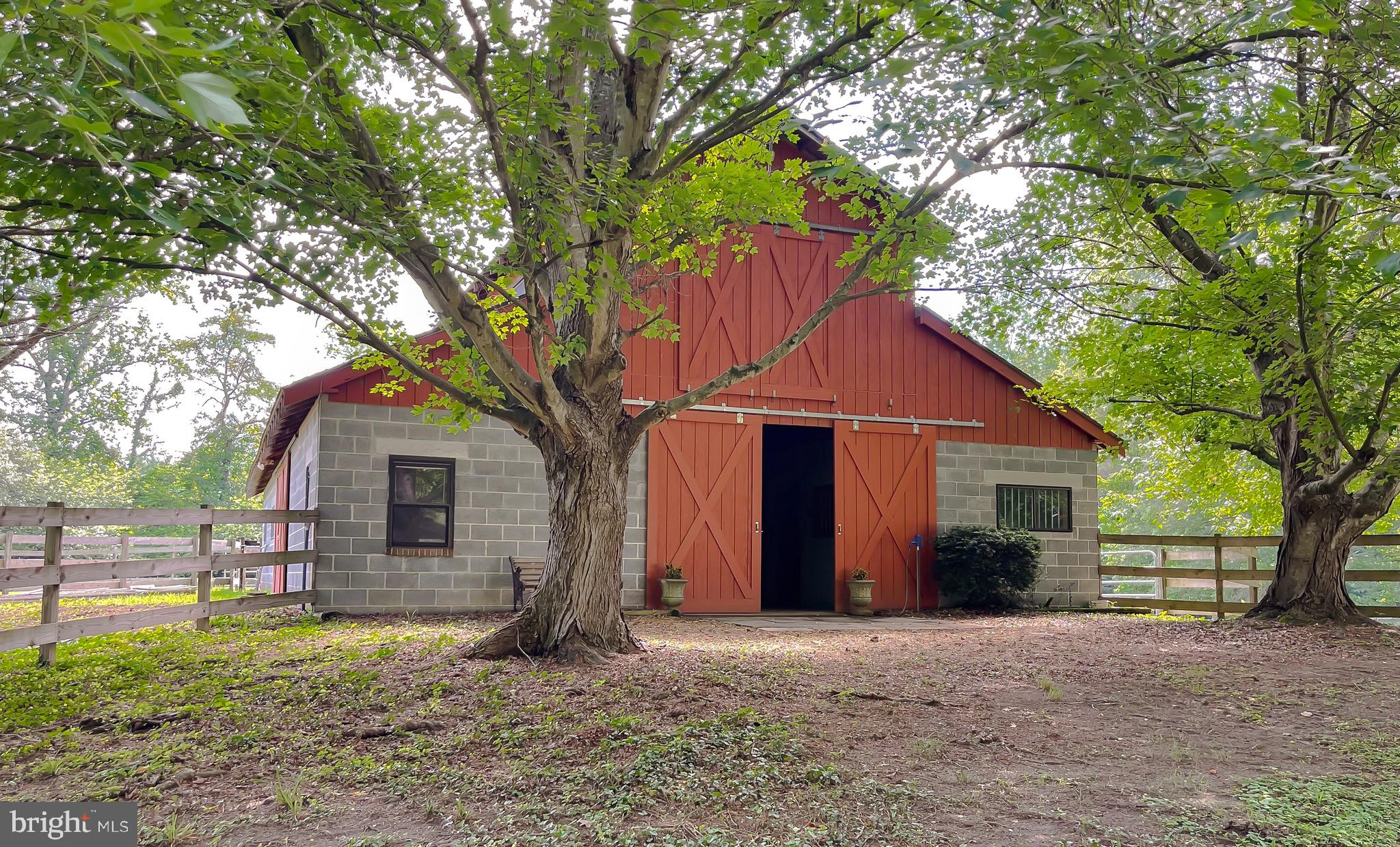 3050 Ross Road St. Leonard, MD 20685 - Photo 80 of 87 a front view of a house with a yard and large tree