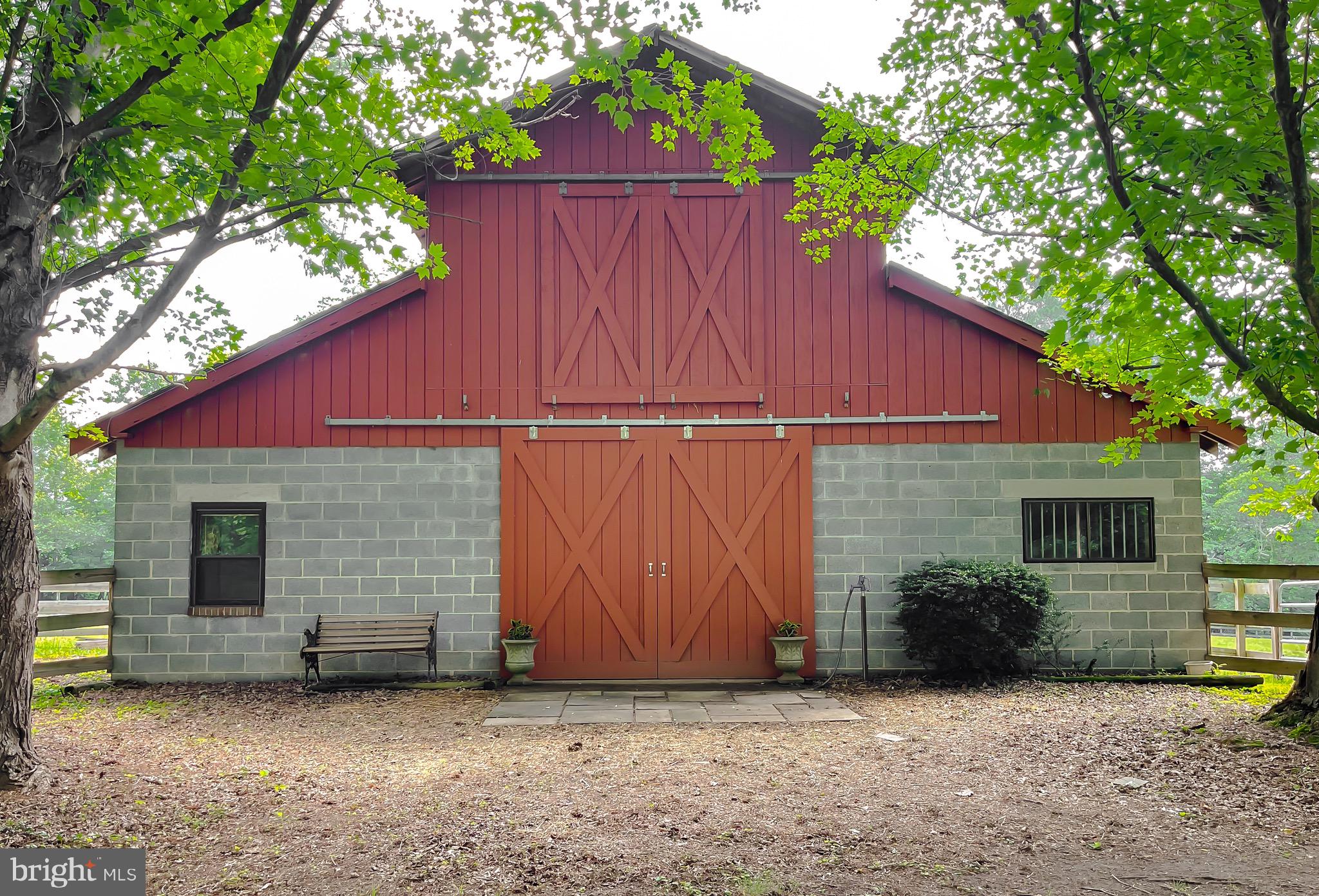 3050 Ross Road St. Leonard, MD 20685 - Photo 10 of 87 a view of a house with backyard and a tree