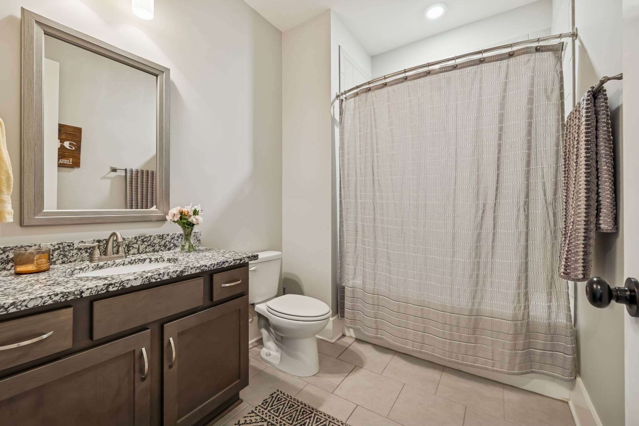 142 Vanner Road Mount Juliet, TN 37122 - Photo 11 of 52 a bathroom with a granite countertop sink toilet and shower