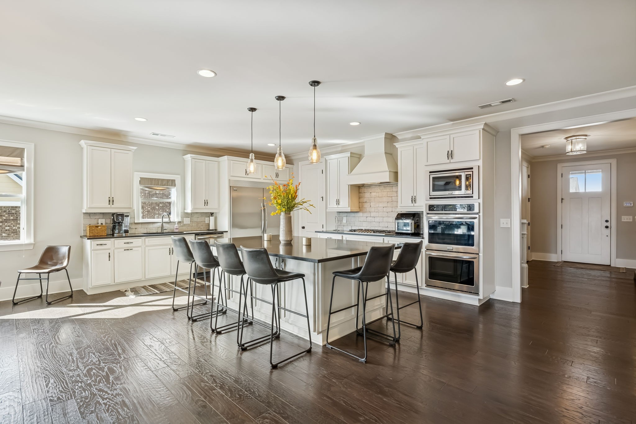 142 Vanner Road Mount Juliet, TN 37122 - Photo 13 of 52 a large kitchen with a table and chairs
