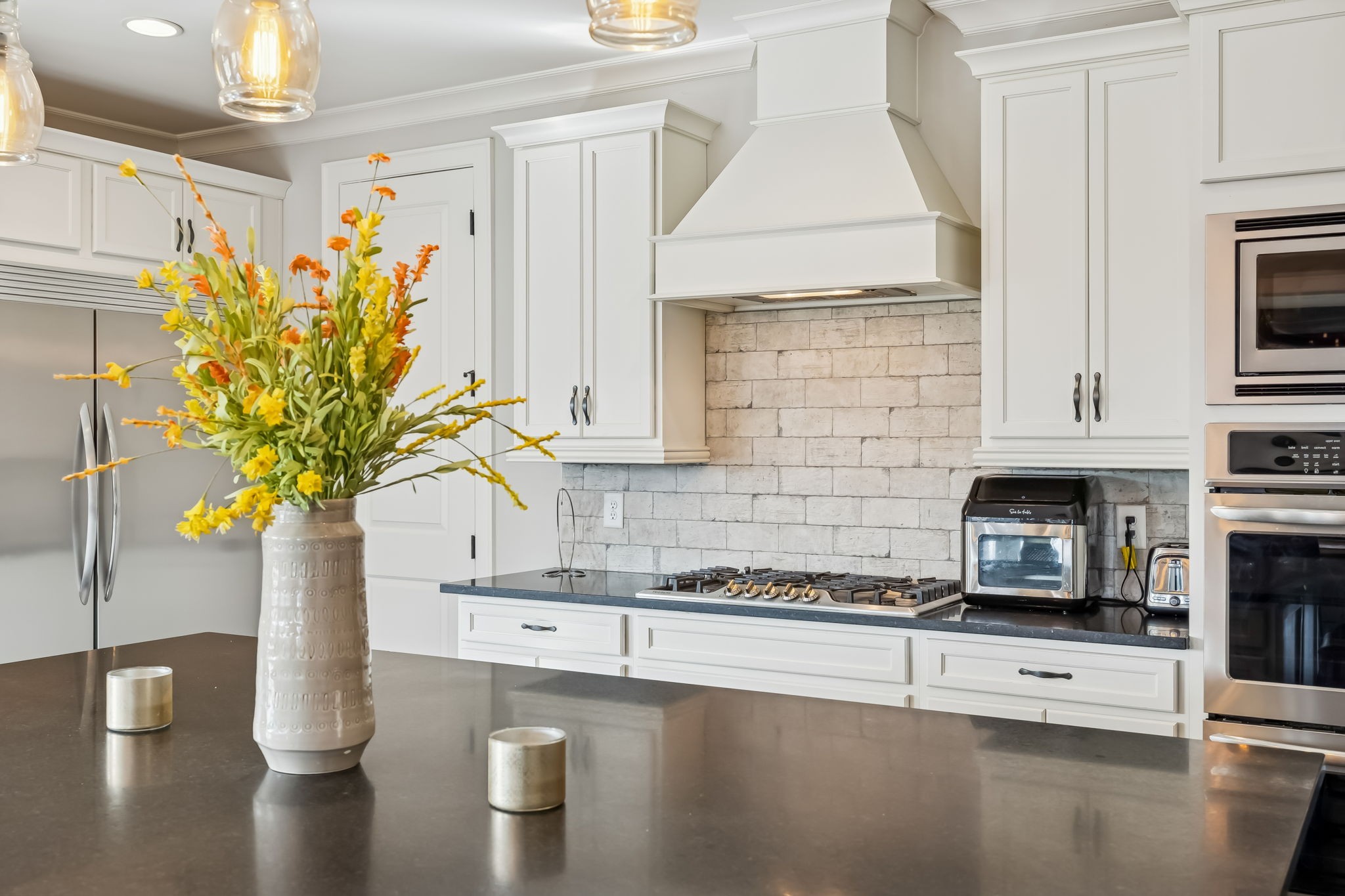 142 Vanner Road Mount Juliet, TN 37122 - Photo 17 of 52 a kitchen with a refrigerator a stove and a sink