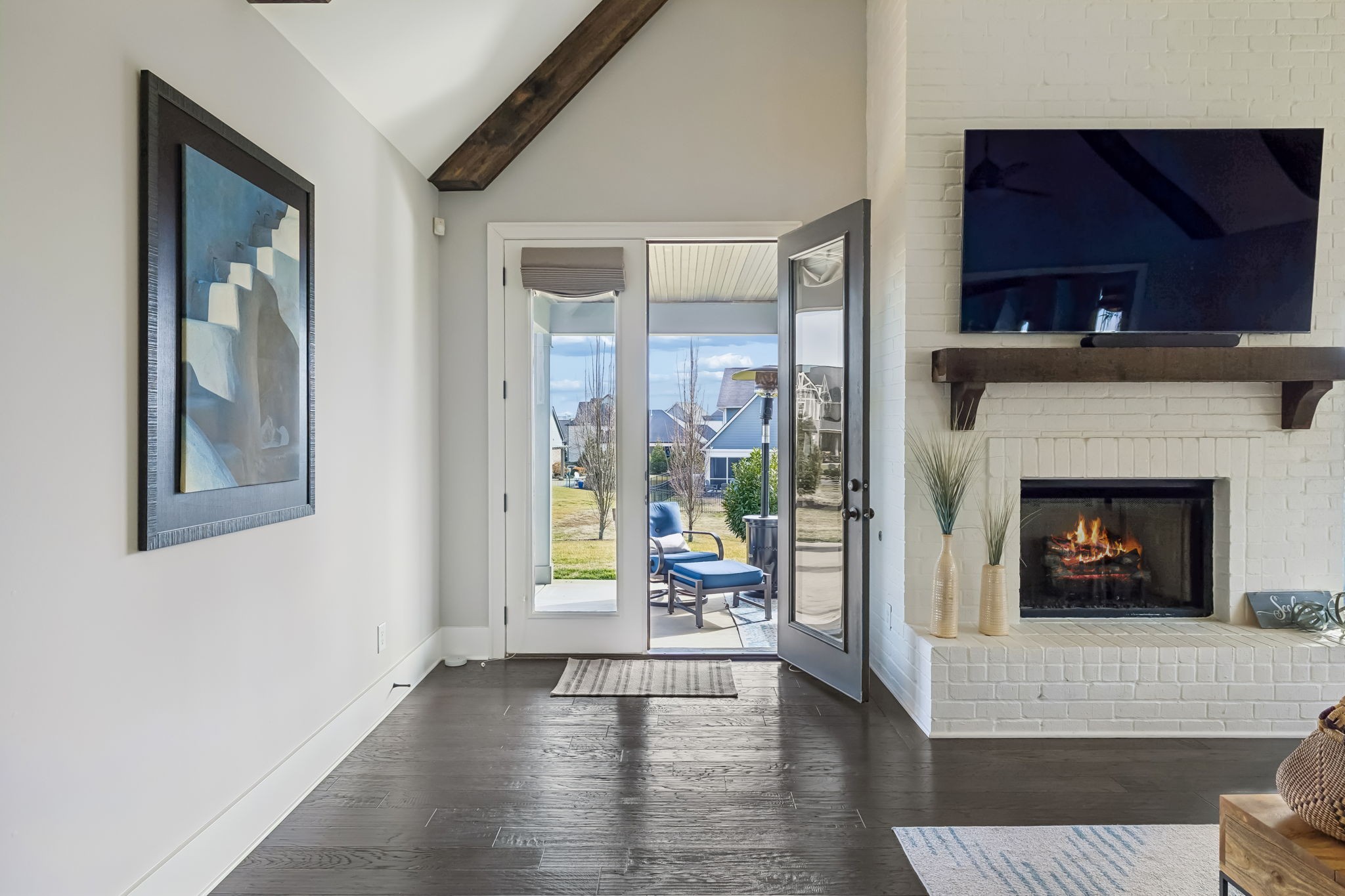 142 Vanner Road Mount Juliet, TN 37122 - Photo 25 of 52 a living room with furniture and a fireplace