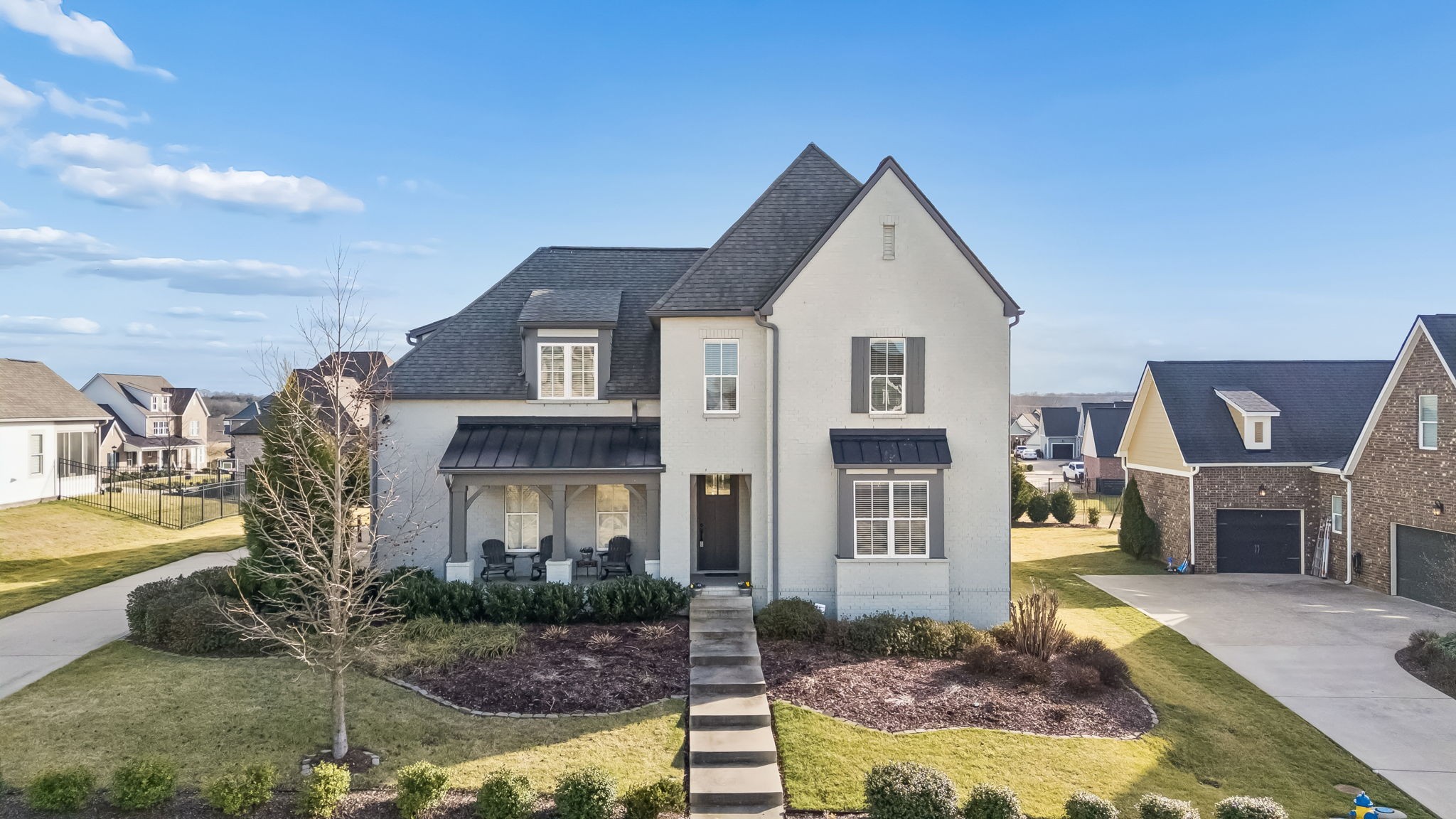 142 Vanner Road Mount Juliet, TN 37122 - Photo 3 of 52 a front view of a house with a yard