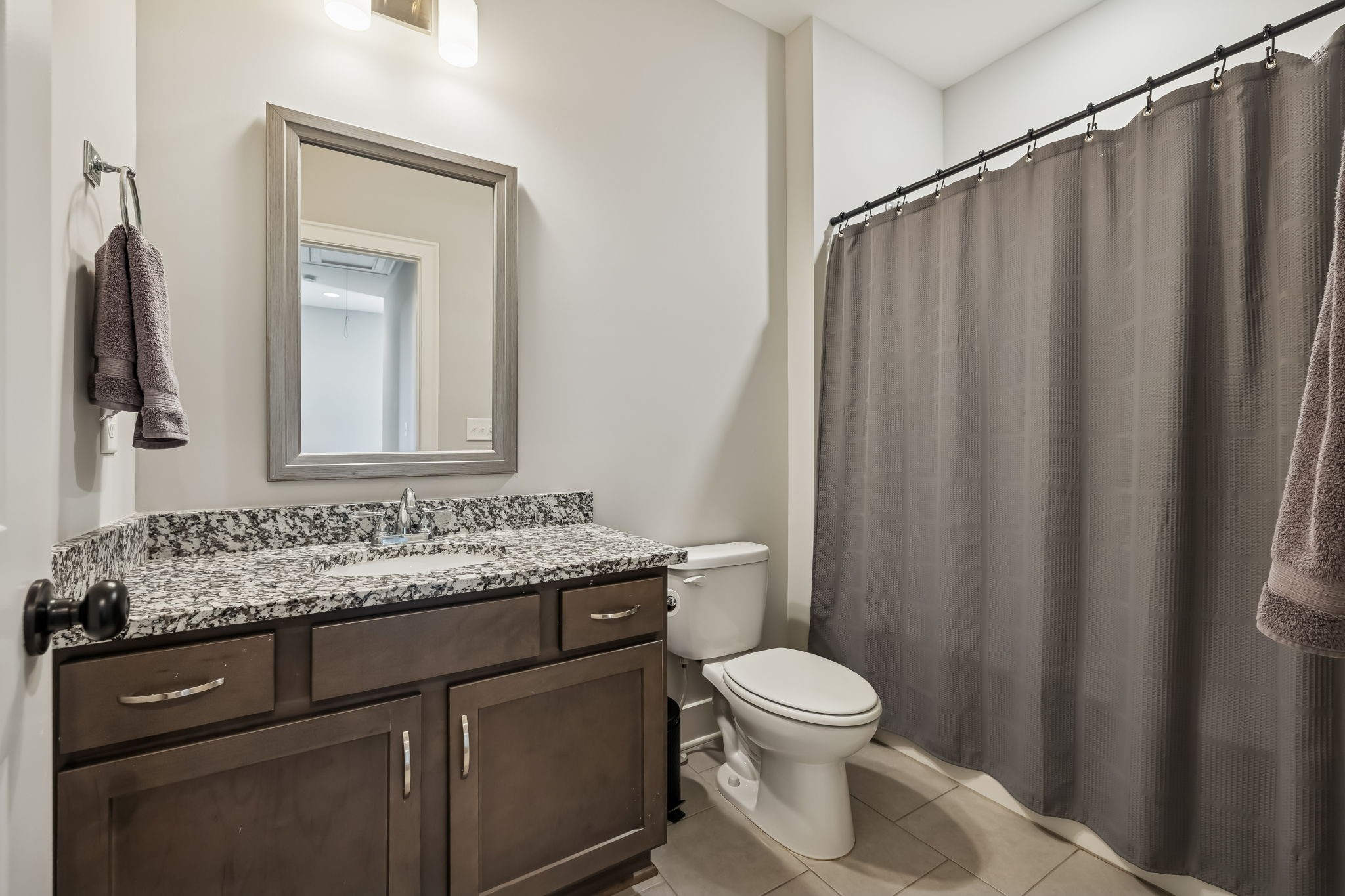 142 Vanner Road Mount Juliet, TN 37122 - Photo 38 of 52 a bathroom with a granite countertop sink toilet and mirror