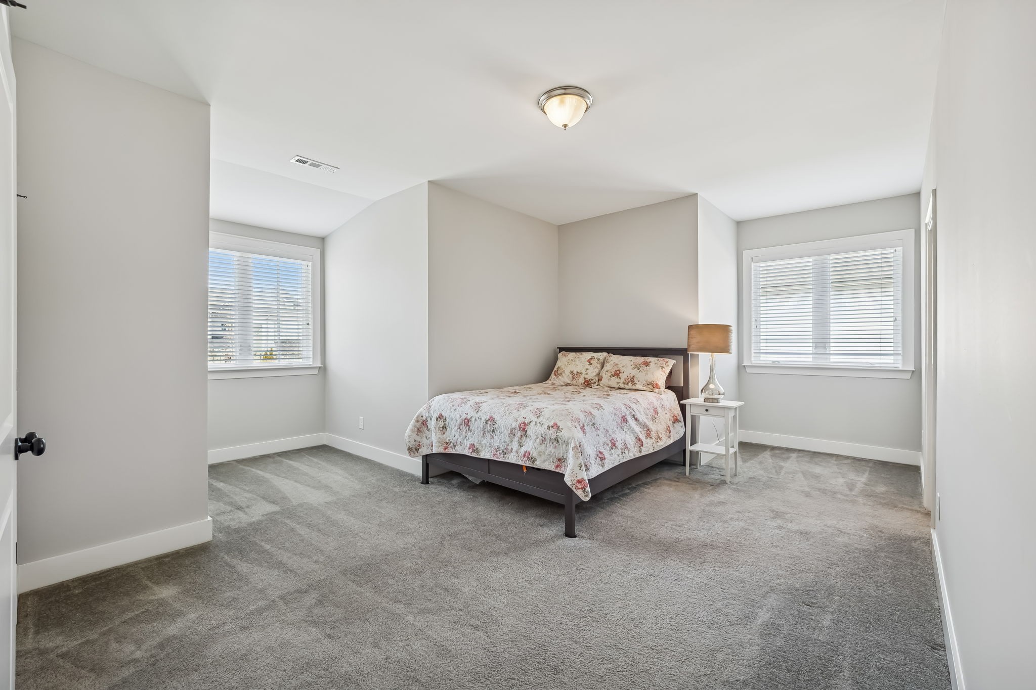 142 Vanner Road Mount Juliet, TN 37122 - Photo 39 of 52 a bedroom with a bed and a window