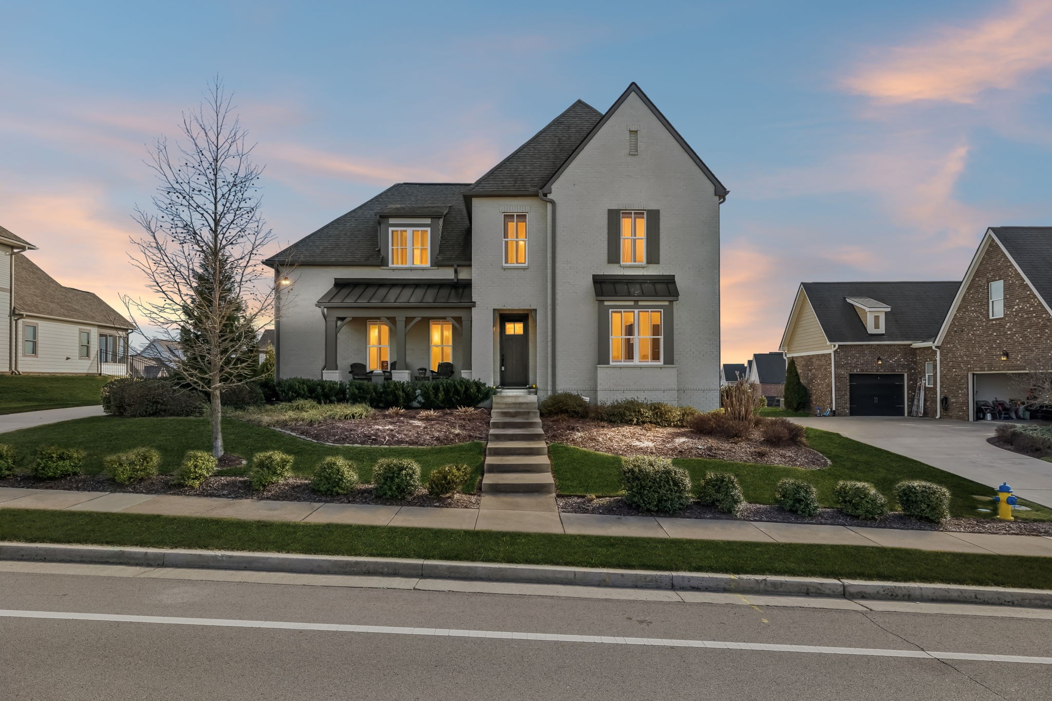 142 Vanner Road Mount Juliet, TN 37122 - Photo 4 of 52 a front view of a house with a yard