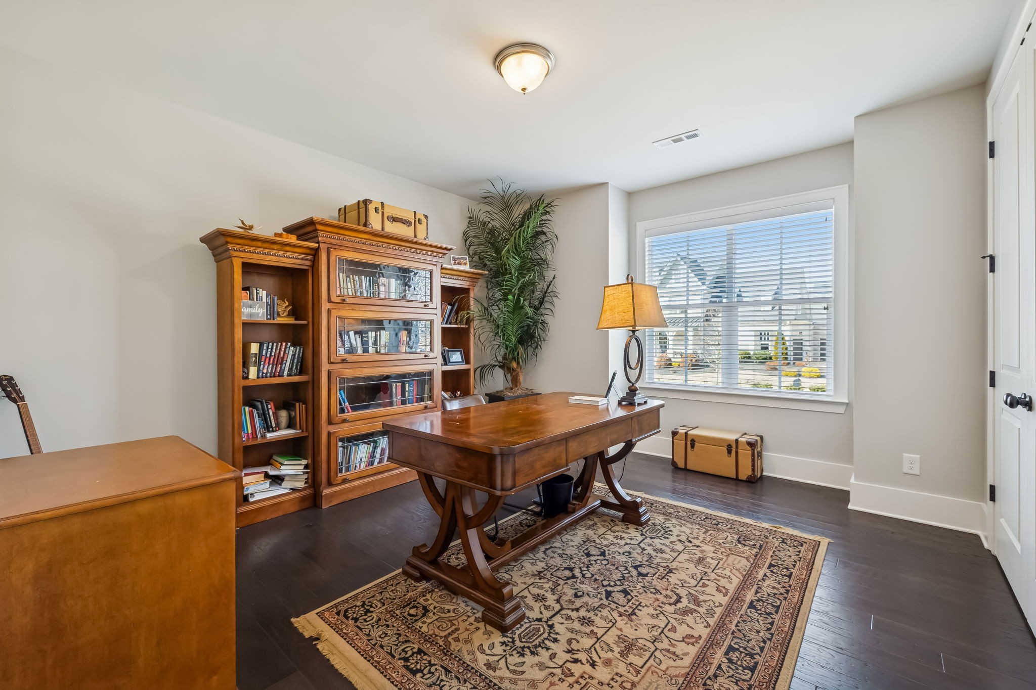 142 Vanner Road Mount Juliet, TN 37122 - Photo 10 of 52 a living room with furniture and a book shelf