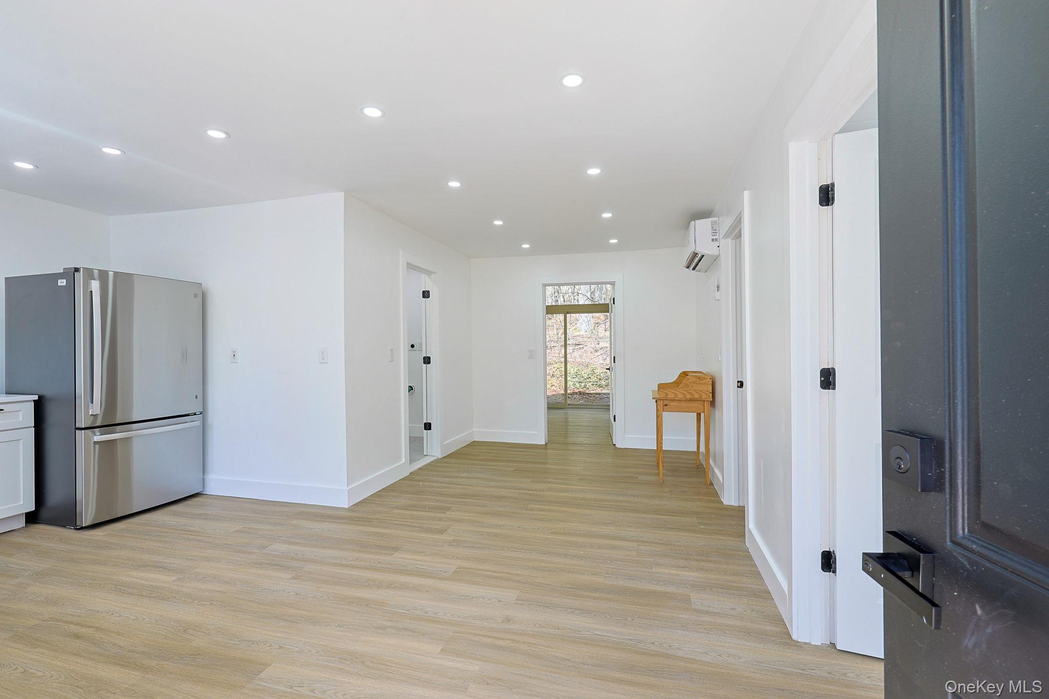 25 Overlook Road Woodbourne, NY 12788 - Photo 5 of 22 a view of a kitchen with a refrigerator and a stove top oven