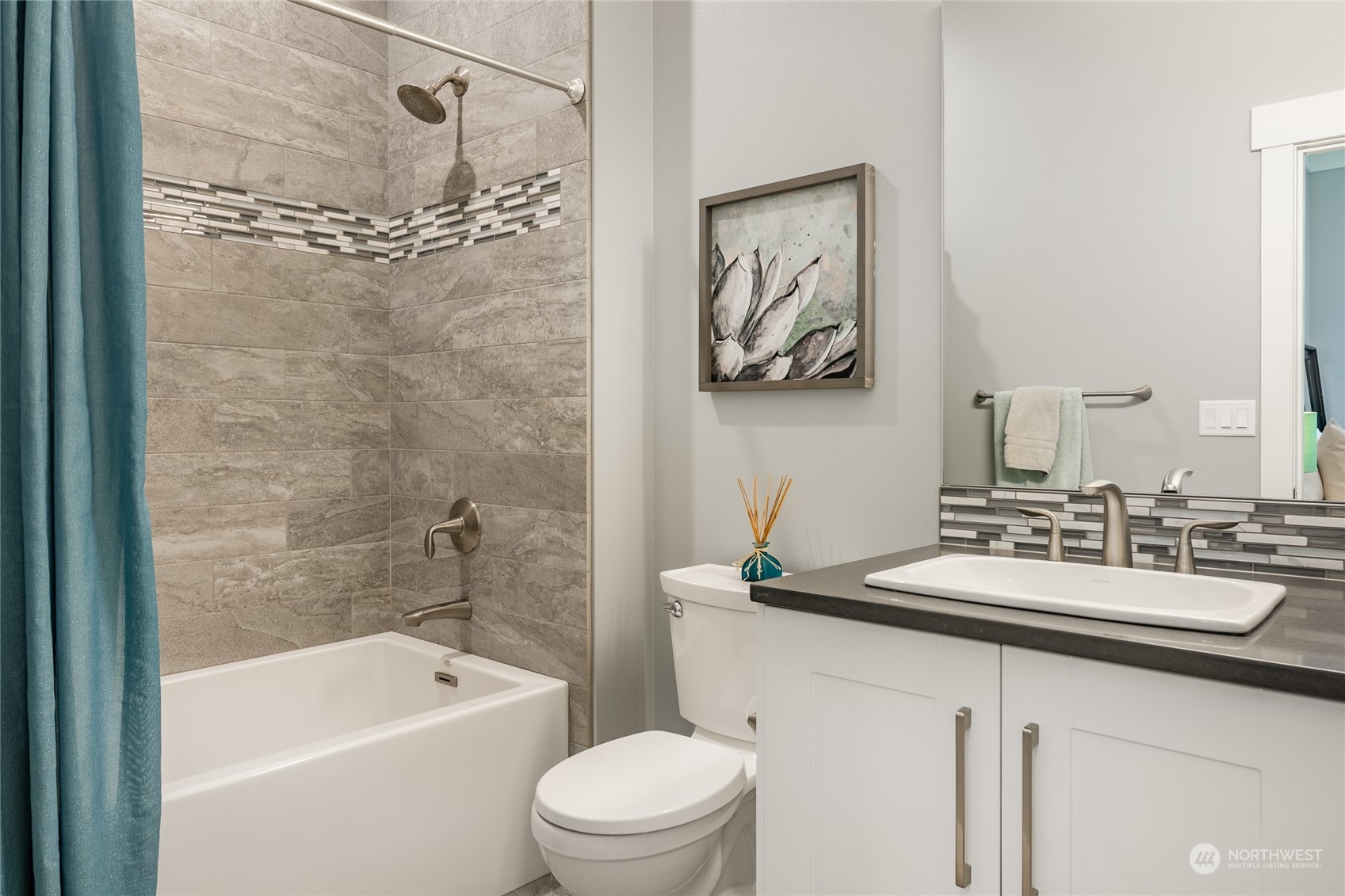 5433 Canvasback Road Blaine, WA 98230 - Photo 16 of 34 a bathroom with a sink a toilet and a bathtub