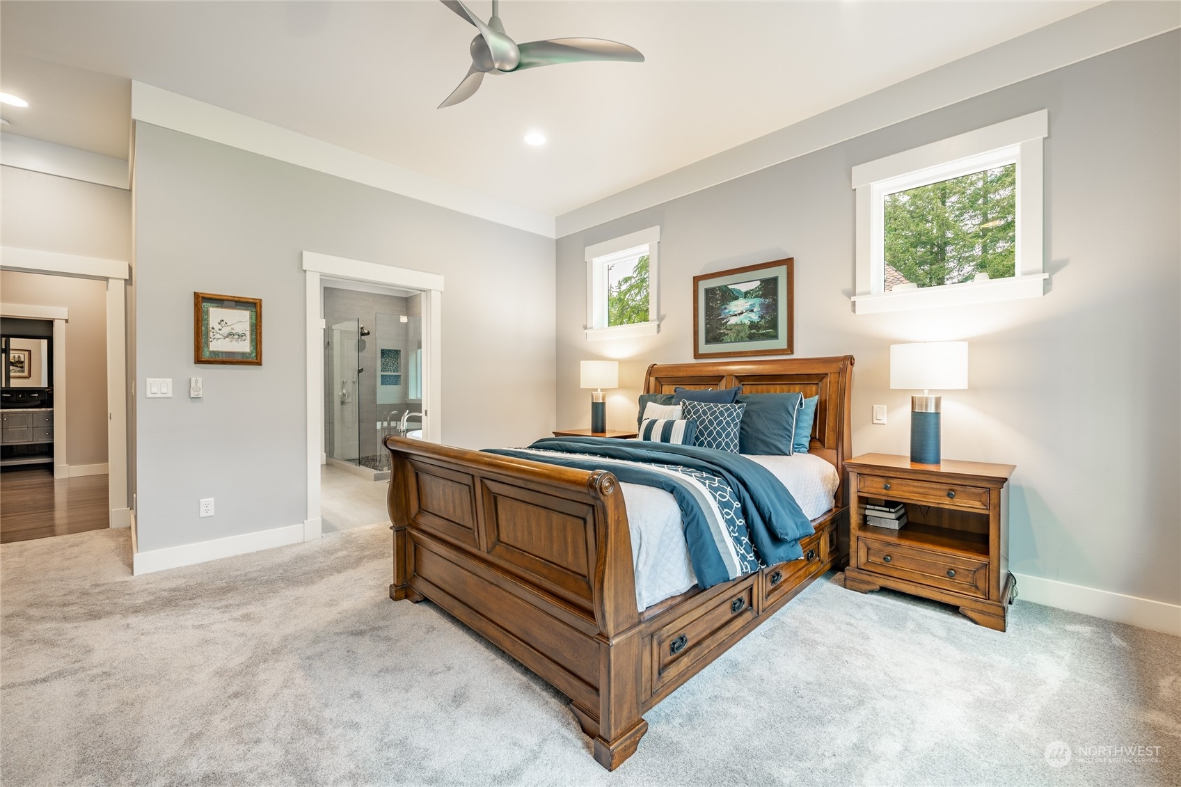 5433 Canvasback Road Blaine, WA 98230 - Photo 18 of 34 a spacious bedroom with a bed and a cabinets