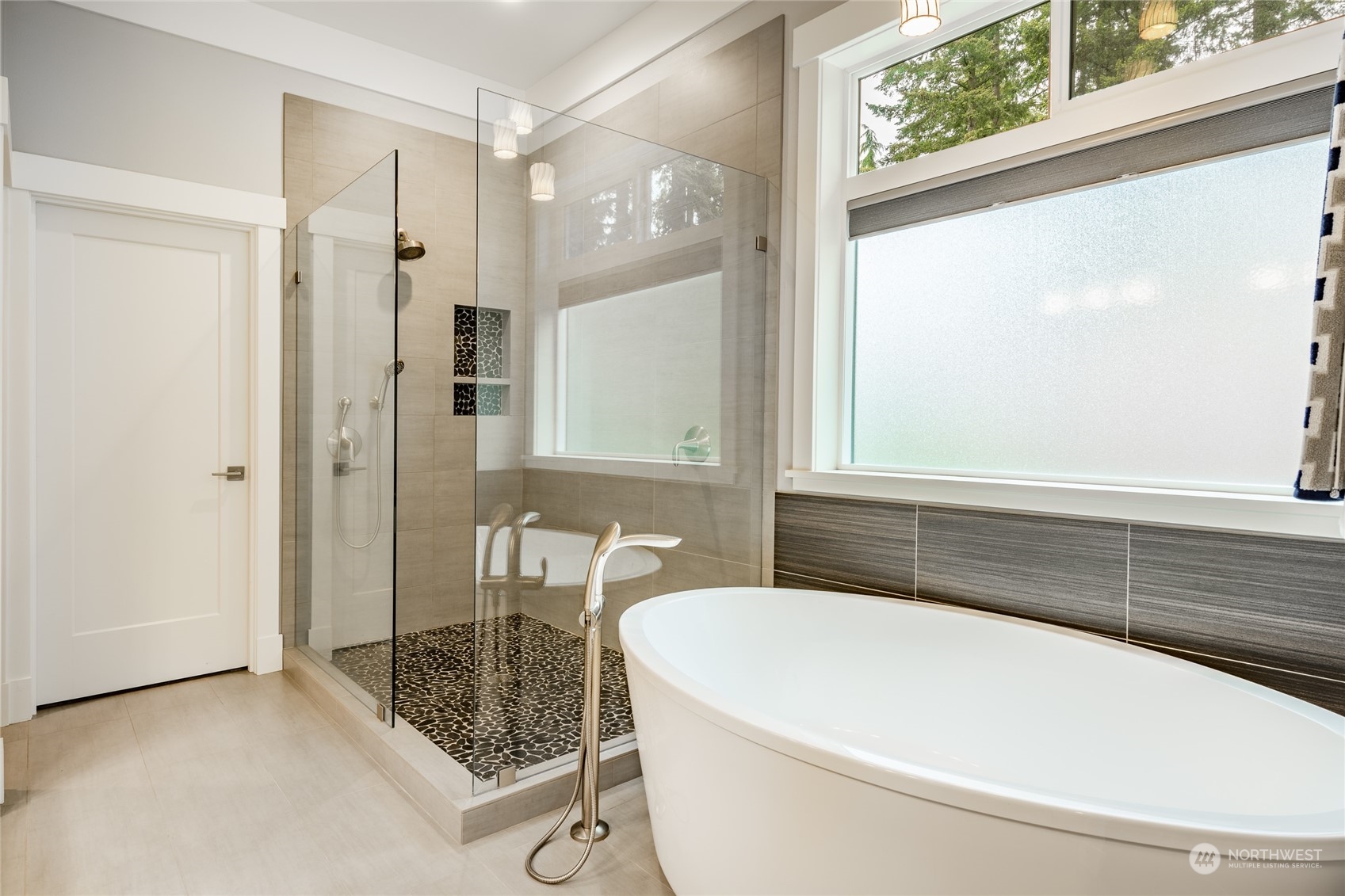 5433 Canvasback Road Blaine, WA 98230 - Photo 19 of 34 a bathroom with a bathtub and a shower