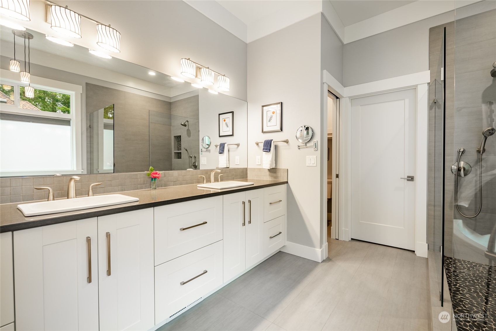 5433 Canvasback Road Blaine, WA 98230 - Photo 20 of 34 a bathroom with a double vanity sink mirror and double