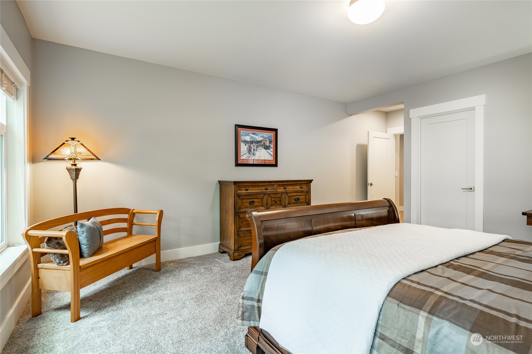 5433 Canvasback Road Blaine, WA 98230 - Photo 25 of 34 a bedroom with a bed and a couch