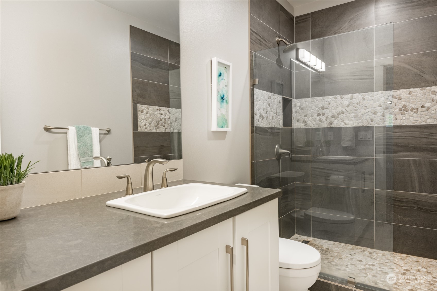 5433 Canvasback Road Blaine, WA 98230 - Photo 26 of 34 a bathroom with a sink a toilet and shower