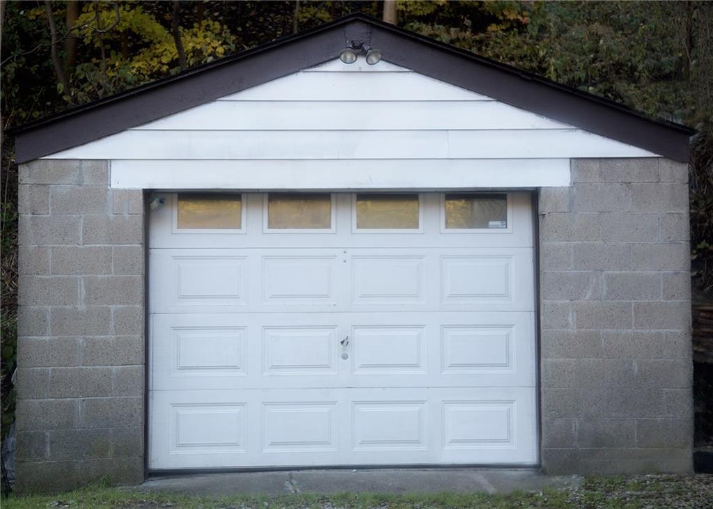795 Becks Run Road Pittsburgh, PA 15210 - Photo 14 of 14 One car detached garage has enough room to store more than just your car.