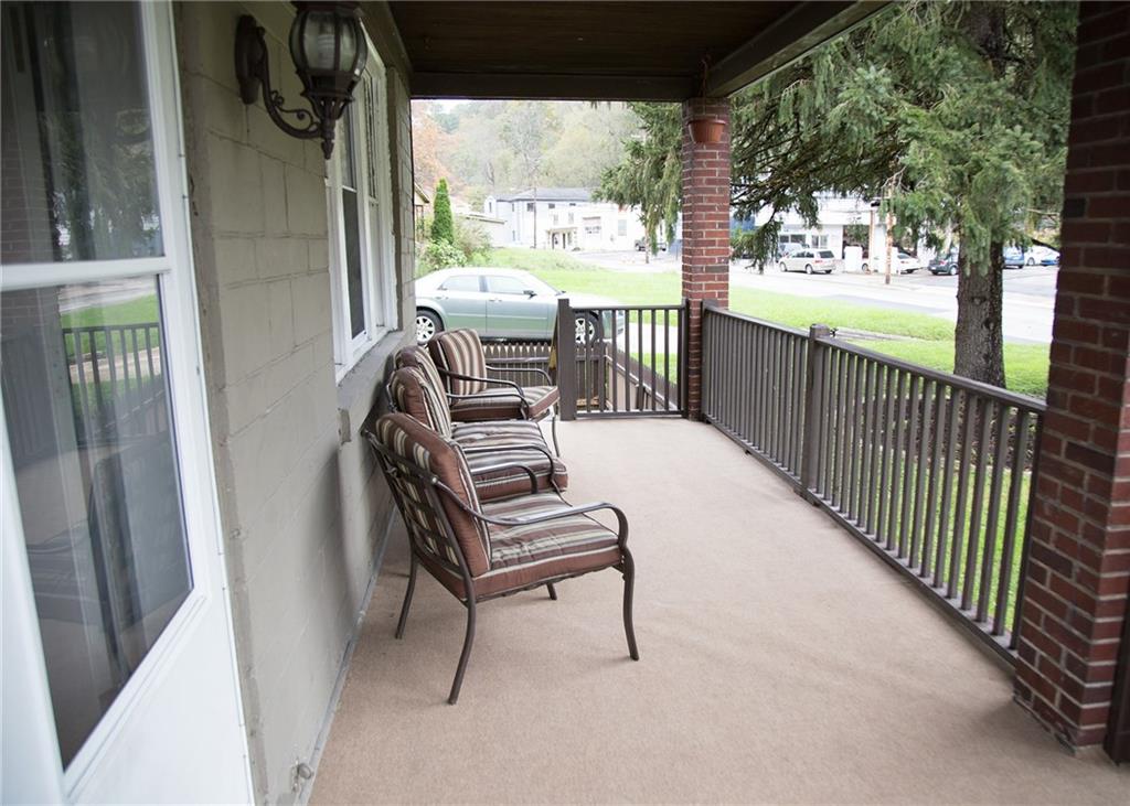 795 Becks Run Road Pittsburgh, PA 15210 - Photo 3 of 14 Front porch offers new carpet and place to relax and watch the world go by!