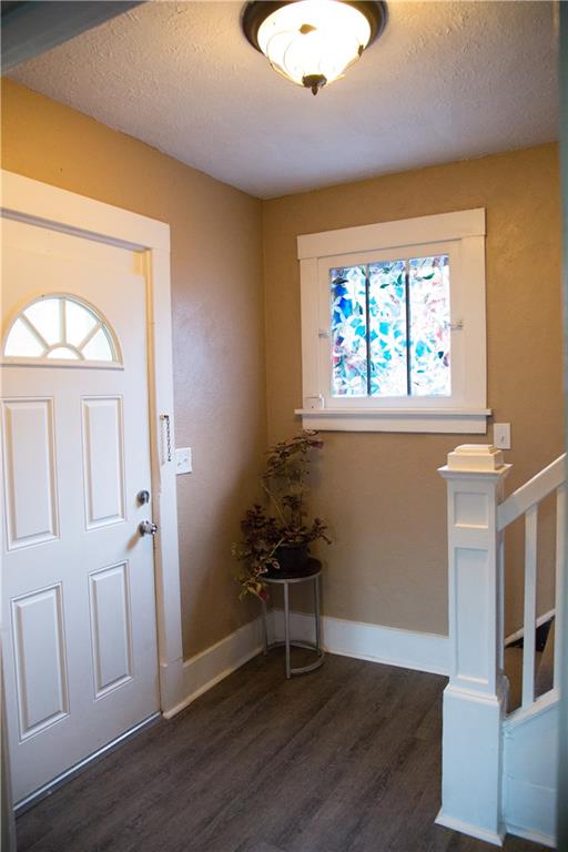 795 Becks Run Road Pittsburgh, PA 15210 - Photo 4 of 14 Entrance with new flooring and fresh paint.
