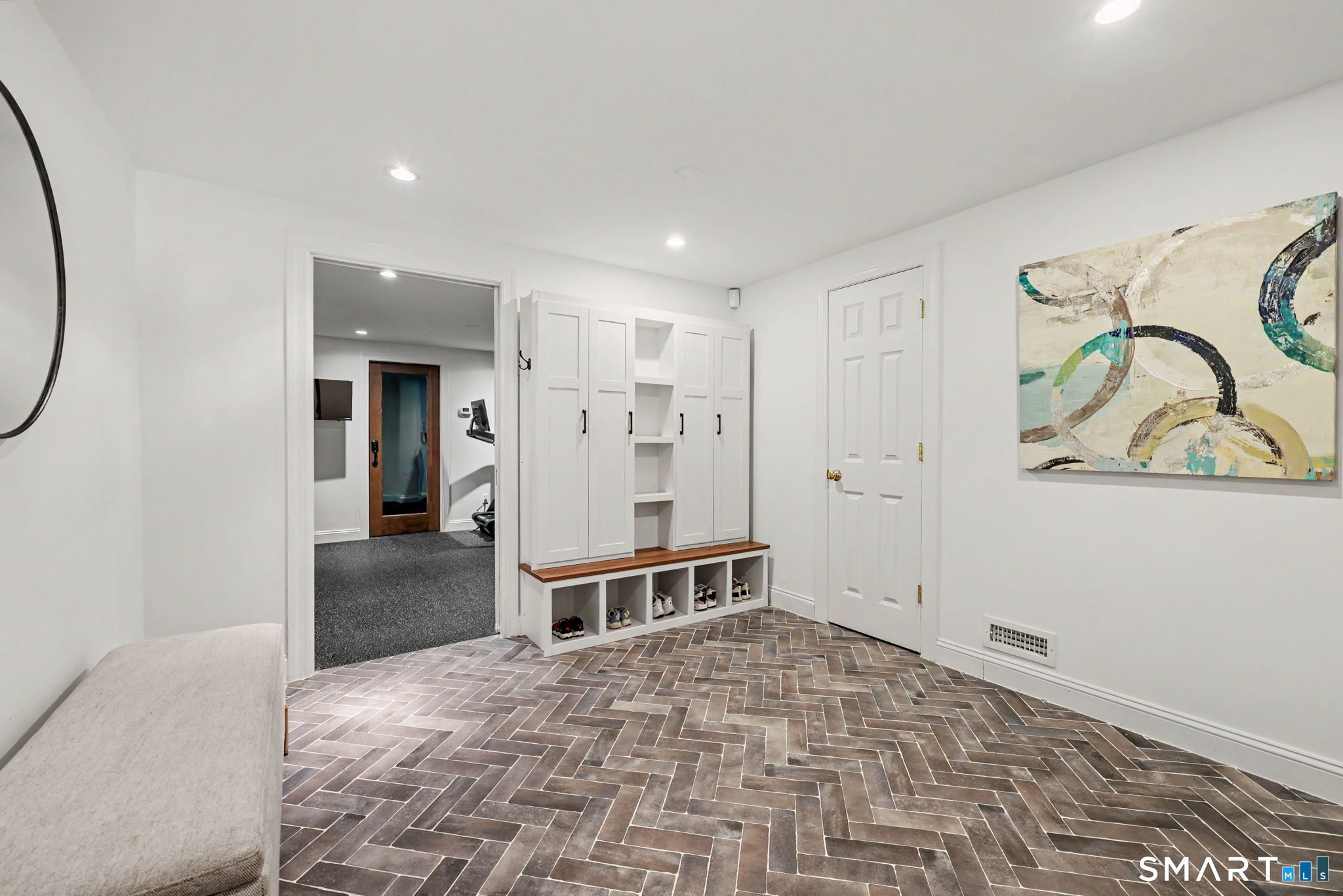10 Side Hill Road Westport, CT 06880 - Photo 35 of 40 a view of a hallway with wooden floor and workspace