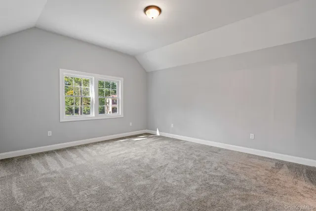a view of a room with window wooden floor and outdoor space