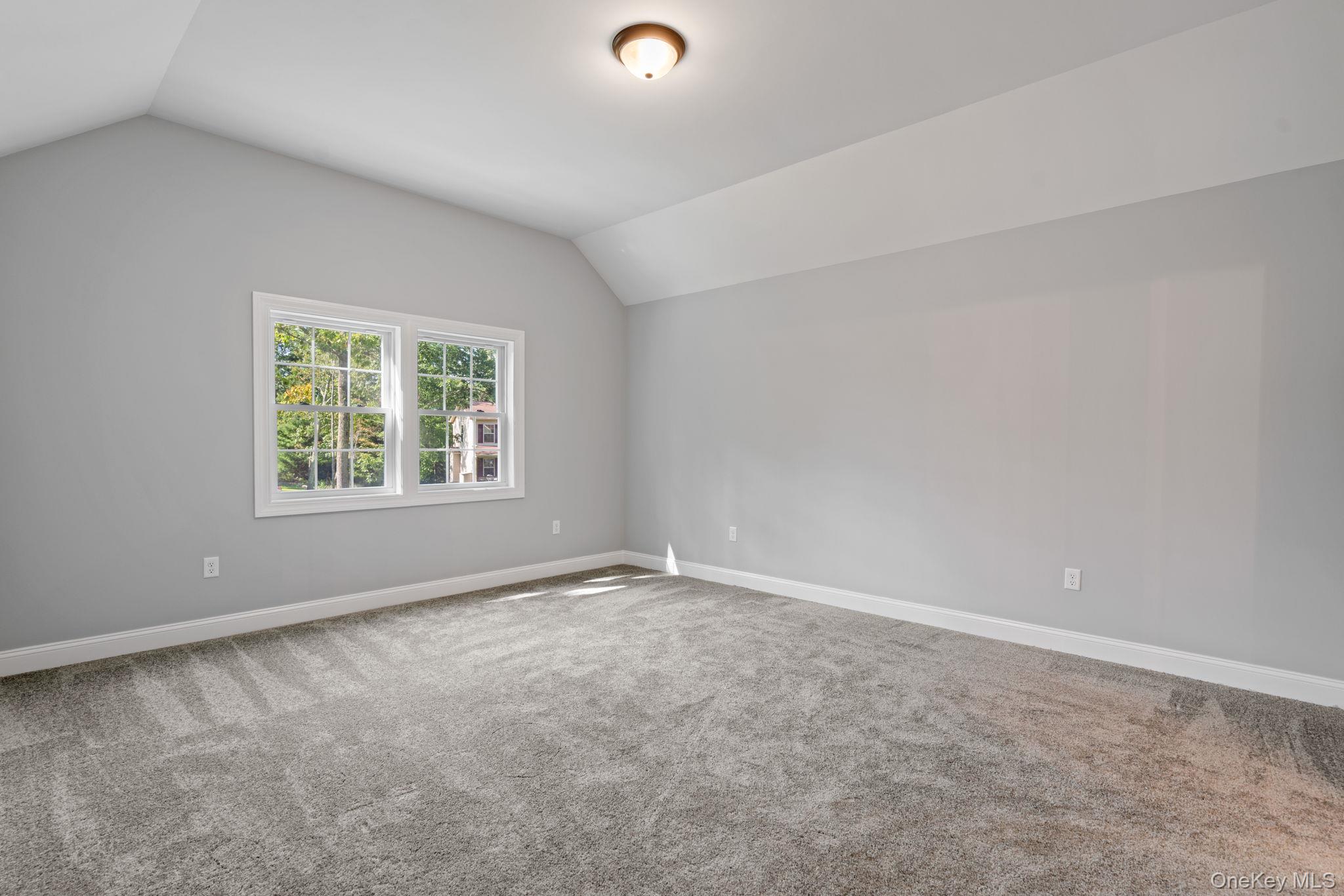 61 Smith Avenue Walden, NY 12586 - Photo 14 of 42 an empty room with windows