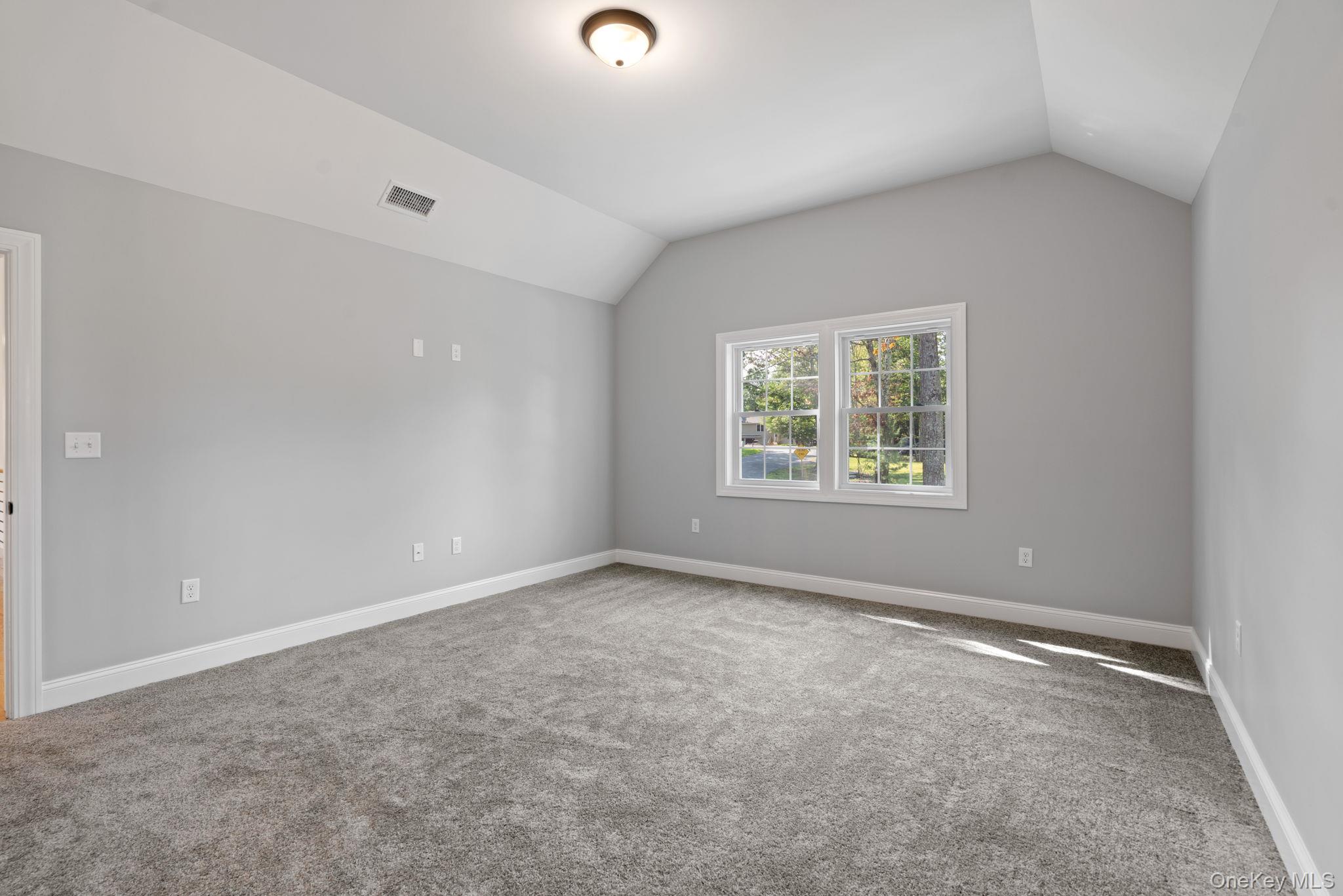 61 Smith Avenue Walden, NY 12586 - Photo 15 of 42 an empty room with windows