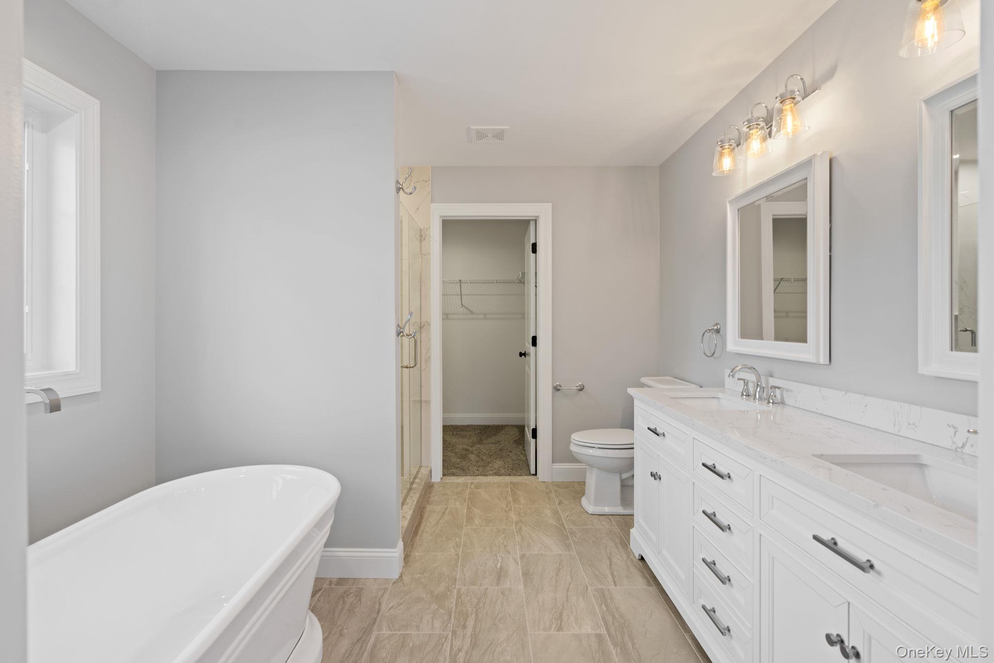 61 Smith Avenue Walden, NY 12586 - Photo 17 of 42 a bathroom with a sink a toilet and shower